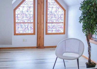Private Log Chalet - top level room with chair